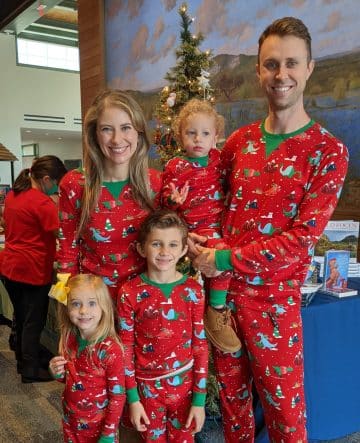 family in pajamas at the holiday market