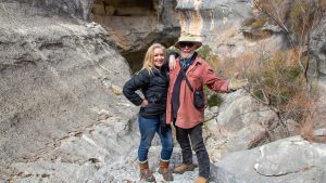 hikers standing in canyon