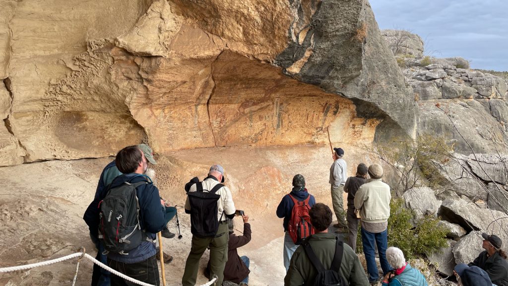 group of hikers looking at White Shaman Preserve