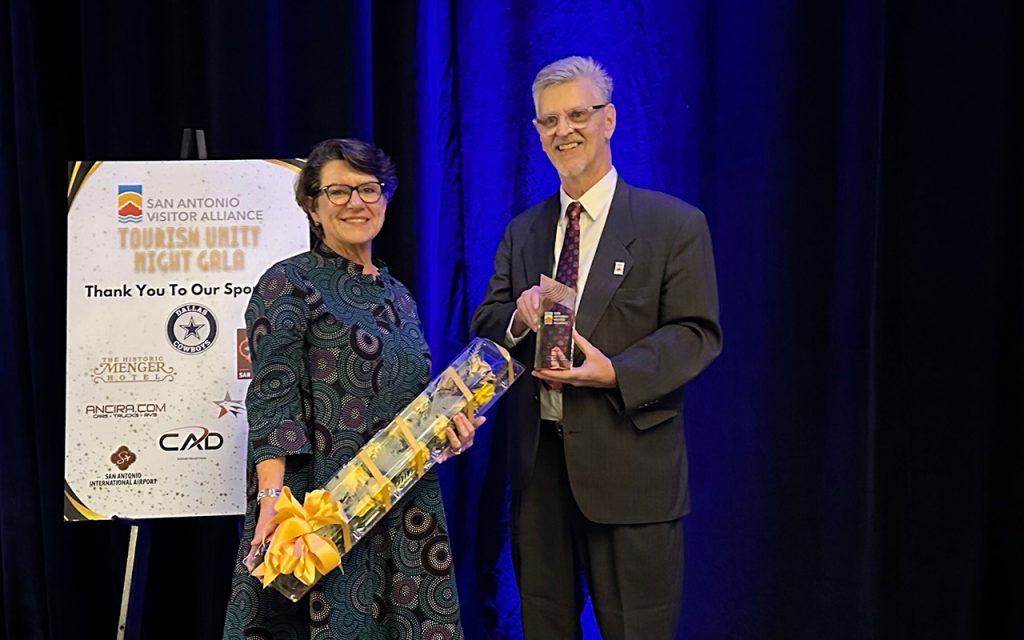 Marise McDermott is presented with the Milton Guess Hospitality Award by Bill Brendel on September 14, 2023 at the Tourism Unity Night Gala.