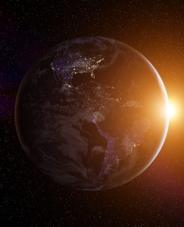 Planet Earth with rising Sun, view from space. Elements of this image furnished by NASA