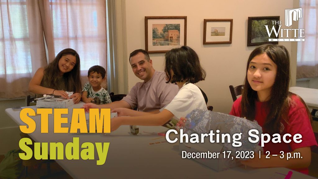 Family sits around a table working on a science project.