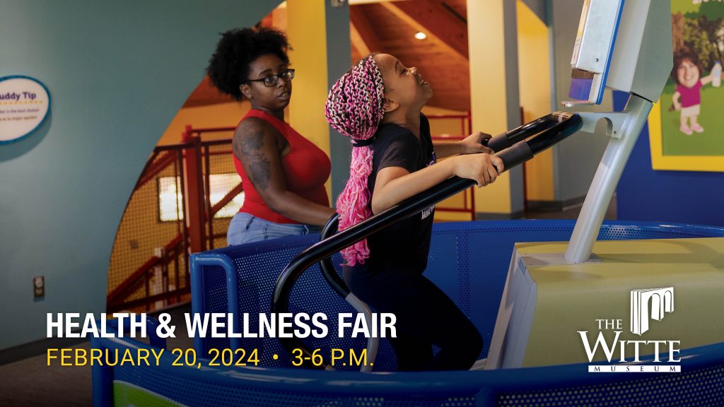 young girl smiles while using stair climber machine.